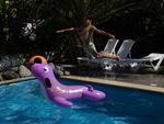 jumping into the pool