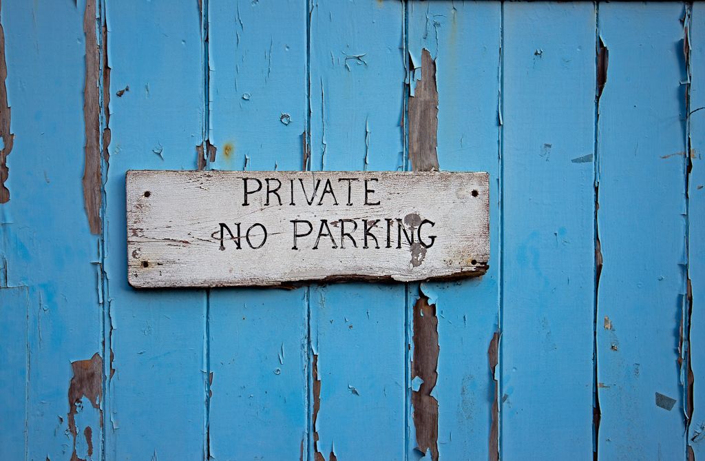 I spotted this photograph whilst walking can to my car after spending some time photographing the beautiful fishing village of Polperro.  I loved the way the neglect had created the textures the door and sign.