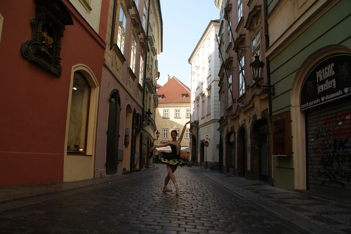 On my flight scale from Madrid to Yerevan I stopped ten hours at Prague.  At 7 o' clock in the morning I was walking down the street and found this asian girl. She is called Wenny and is at Prague for a Ballet contest.